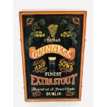 A REPRODUCTION GUINNESS FINEST EXTRA STOUT PUB ADVERTISING SIGN 90CM H X 60CM W.