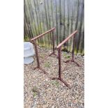 A PAIR OF VINTAGE WROUGHT METAL STANDS