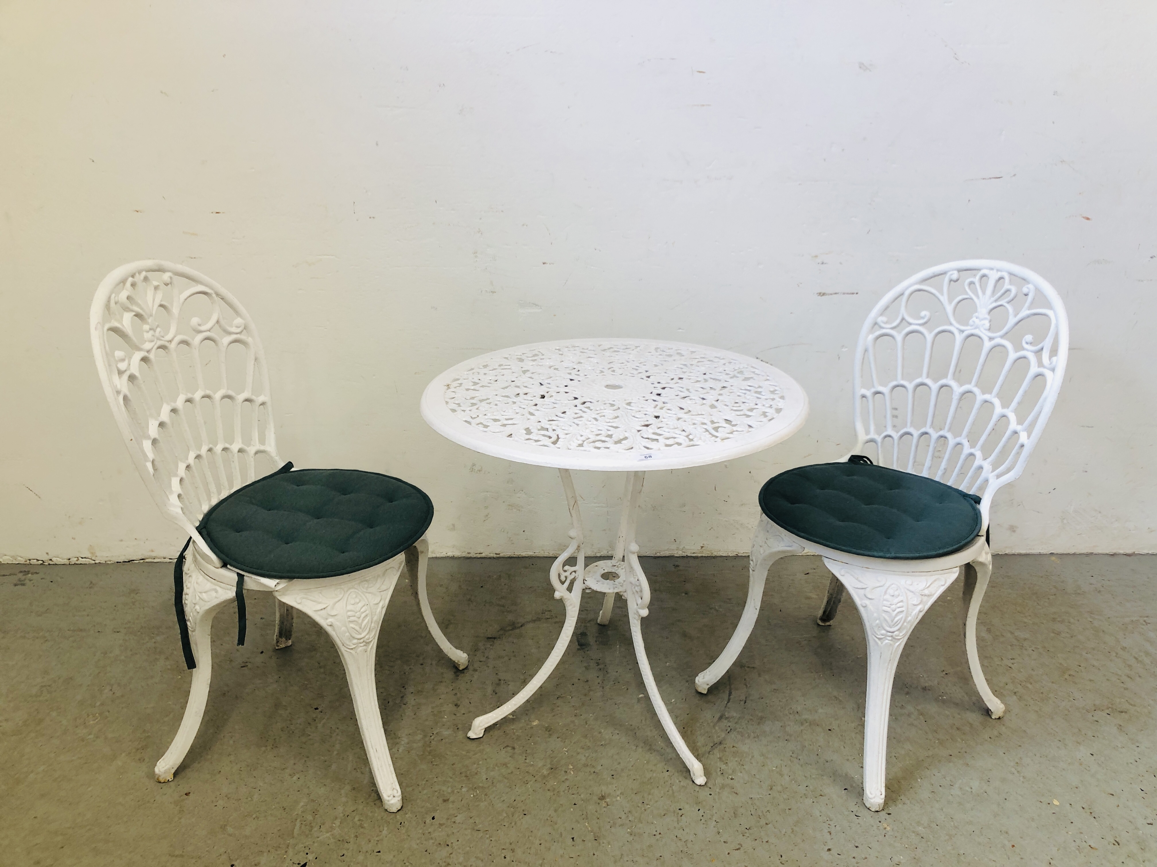 A WHITE FINISH CAST METAL BISTRO SET COMPRISING OF CIRCULAR TABLE AND 2 CHAIRS - Image 6 of 6