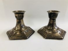 A PAIR OF ANTIQUE SILVER CANDLESTICKS BIRMINGHAM ASSAY W.H.H. H 9CM.