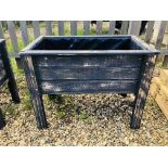 A RECLAIMED WOODEN RAISED TROUGH PLANTER FINISHED IN GREY 73CM W X 39CM D X 61CM H.