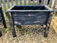 A RECLAIMED WOODEN RAISED TROUGH PLANTER FINISHED IN GREY 73CM W X 39CM D X 61CM H.