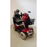 A SHOPRIDER DELUXE MOBILITY SCOOTER AND CHARGER (KEY WITH AUCTIONEER) - SOLD AS SEEN.