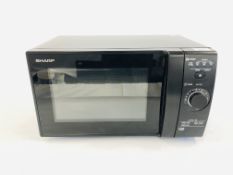 A SHARP MICROWAVE - SOLD AS SEEN.