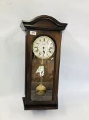 A MAHOGANY CASED WESTMINSTER CHIME WALL CLOCK WITH KEY AND PENDULUM.