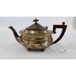 A SILVER TEAPOT,