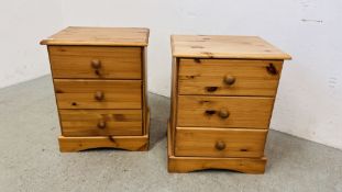 A PAIR OF HONEY PINE THREE DRAWER BEDSIDE CHESTS.