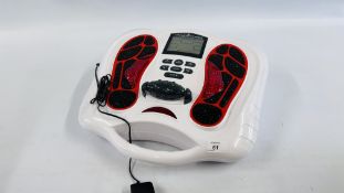 A CIRCULATION MAXX FOOT MASSAGER - SOLD AS SEEN.