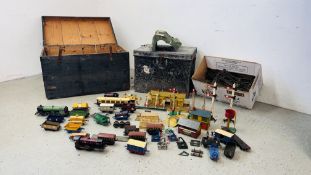 TWO LARGE TRUNKS CONTAINING AN EXTENSIVE COLLECTION OF VINTAGE 0 GAUGE TIN PLATE TRAINS,