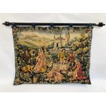 A LARGE POLE MOUNTED TAPESTRY OF MEDIEVAL SCENE, W 116CM, H 90CM, POLE WIDTH 145CM.