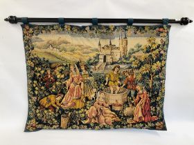 A LARGE POLE MOUNTED TAPESTRY OF MEDIEVAL SCENE, W 116CM, H 90CM, POLE WIDTH 145CM.