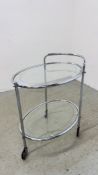 A RETRO CHROME FINISH TWO TIER GLASS TEA TROLLEY.