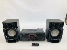 A PANASONIC CD STEREO SYSTEM MODEL SA-AKX320 WITH REMOTE AND SPEAKERS - SOLD AS SEEN.