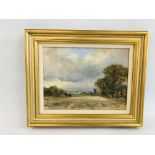 A GILT FRAMED OIL ON BOARD DEPICTING A RURAL CHURCH LANDSCAPE "REPPS NORFOLK" BEARING SIGNATURE