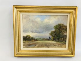 A GILT FRAMED OIL ON BOARD DEPICTING A RURAL CHURCH LANDSCAPE "REPPS NORFOLK" BEARING SIGNATURE