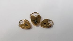 A GROUP OF THREE 9CT GOLD SAFETY PADLOCKS.