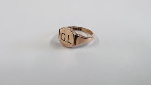 A 9CT GOLD MONOGRAM SIGNET RING.