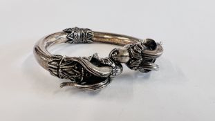 AN ETRUSCAN STYLE SILVER BANGLE