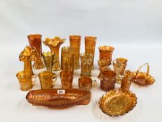AN EXTENSIVE GROUP OF CARNIVAL GLASSWARE TO INCLUDE BOAT PLANTER, VASES, BEAKERS AND BASKETS ETC.