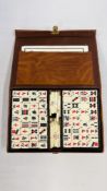 A CASED JAQUES MAHJONG SET.