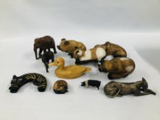 A COLLECTION OF WOODEN AND RESIN ANIMAL FIGURES TO INCLUDE CATS, DOGS, PIG, ELEPHANT, DUCK ETC.