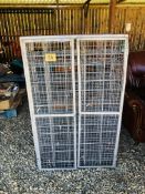 A VINTAGE METAL AND WIRE 60 PIGEON HOLE STORAGE RACK WITH DOORS, W 76CM X D 31CM X H 122CM.