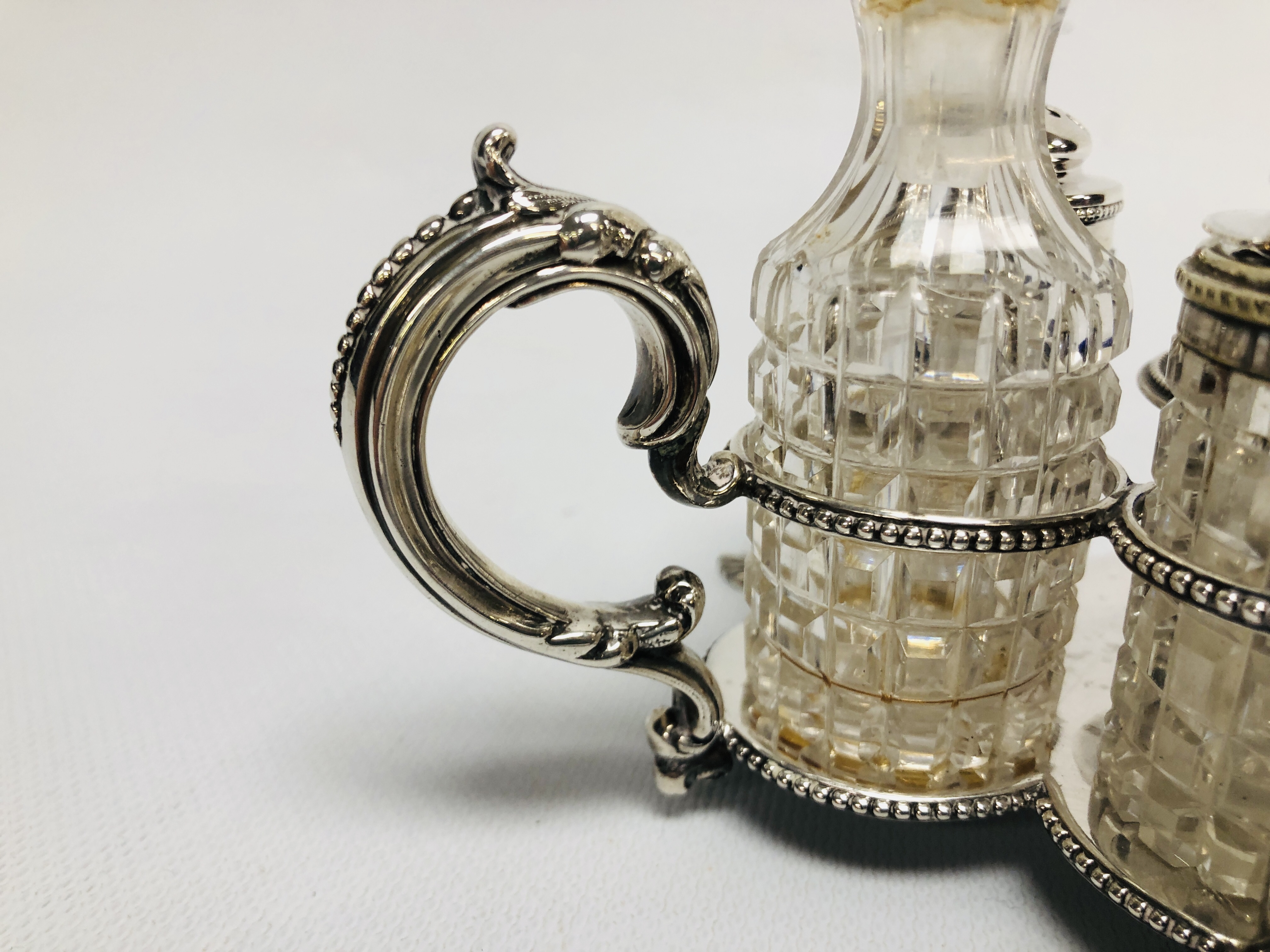 A VICTORIAN SILVER CONDIMENT SET A/F CHIP TO VINEGAR BOTTLE, SHEFFIELD ASSAY. - Image 4 of 12