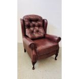 A GOOD QUALITY TAN LEATHER BUTTON BACK WING CHAIR.