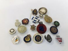 A BAG OF MIXED MILITARY ENAMELLED BADGES