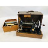 A VINTAGE SINGER SEWING MACHINE IN FITTED CASE.