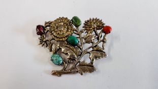 A VINTAGE CHINESE SILVER BROOCH SET WITH SEMI PRECIOUS STONES TO INCLUDE TURQUOISE COLOURED.