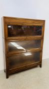 AN OAK SECTIONAL GLOBE WERNICKE STYLE BOOKCASE MARKED "ANGUS" W 87CM X D 25CM X H 113CM.