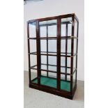 A LARGE AND IMPRESSIVE CAMPAIGN STYLE 3 TIER DISPLAY CABINET WITH BRASS DETAILING BEARING LABEL