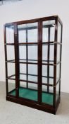 A LARGE AND IMPRESSIVE CAMPAIGN STYLE 3 TIER DISPLAY CABINET WITH BRASS DETAILING BEARING LABEL