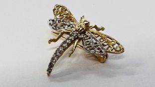 AN ELABORATE DIAMOND SET DRAGONFLY BROOCH MARKED 14K.