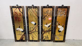 A LACQUERED FOUR PANEL WALL HANGING DECORATED WITH STORKS (EACH PANEL W 31CM H 92CM)