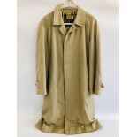 A BEIGE OVERCOAT BEARING MAKERS LABEL BURBERRY 50 REG, 3013/CC G85C, ORDER No. E 12809/3.