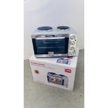 A BOXED MORPHY RICHARDS STAINLESS STEEL CONVECTION MINI OVEN - SOLD AS SEEN.