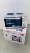 A BOXED MORPHY RICHARDS STAINLESS STEEL CONVECTION MINI OVEN - SOLD AS SEEN.