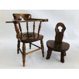 A VINTAGE CHILD'S COMMODE CHAIR ALONG WITH AN OAK CHILD'S CHAIR WITH CARVED BACK.