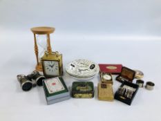 A BOX OF COLLECTIBLES TO INCLUDE AN EGG TIMER, CARRIAGE CLOCK, NAPKIN RINGS,