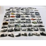 A COLLECTION OF BLACK AND WHITE POSTCARDS AND PHOTOGRAPHS RELATING TO VARIOUS VINTAGE TRUCKS ETC.