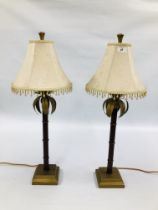 A PAIR OF DESIGNER METAL WORK LAMPS WITH BEADED FRINGED SHADES H 75CM - SOLD AS SEEN.