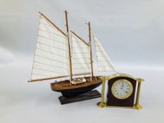 A.Q. WIDDOP CLOCK ALONG WITH A WOODEN MODEL OF A SHIP - 46CM LONG.
