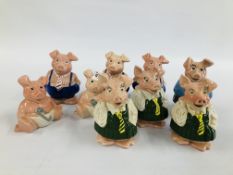 A GROUP OF 9 WADE NATWEST COLLECTORS PIGGY BANKS.
