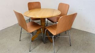 A CIRCULAR DROP SIDE BEECH WOOD DINING TABLE ALONG WITH A SET OF 4 BEECH WOOD EFFECT DINING CHAIRS