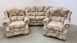 A MODERN FLORAL UPHOLSTERED 3 PIECE LOUNGE SUITE COMPRISING OF 2 CHAIRS AND 3 SEAT SOFA.