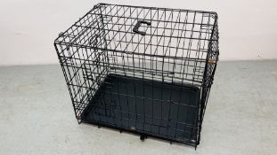 A SMALL PET CRATE.