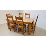 A SOLID OAK EXTENDING DINING TABLE COMPLETE WITH 6 SOLID OAK DINING CHAIRS (CLOSED) 180CM L X 100CM