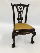 AN ELABORATE REPRODUCTION MAHOGANY CHILD'S CHAIR ON BALL AND CLAW FEET, H 64CM.